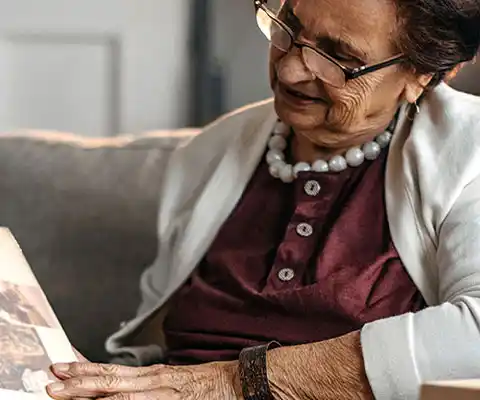 Caregiver and client smiling together